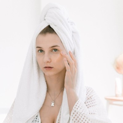 Photo Of Woman Touching Her Face