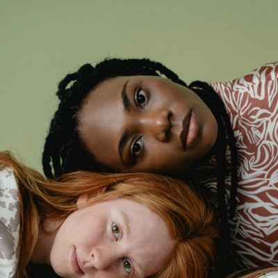 Portrait of Women Lying on One Another