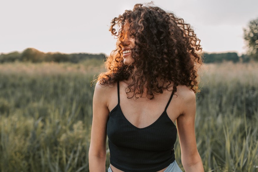 Woman Wearing Black Tank Top