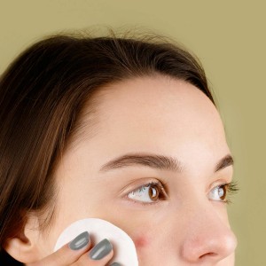 Woman Cleaning Her Face