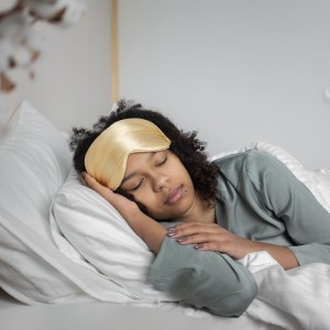 A Woman Sleeping on the Bed