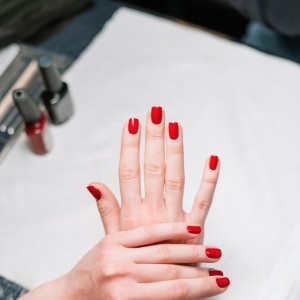 Person With Red Nail Polish