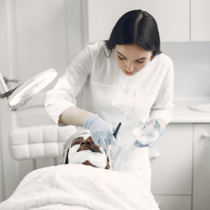 Doctor Looking Down on Patient Lying Down
