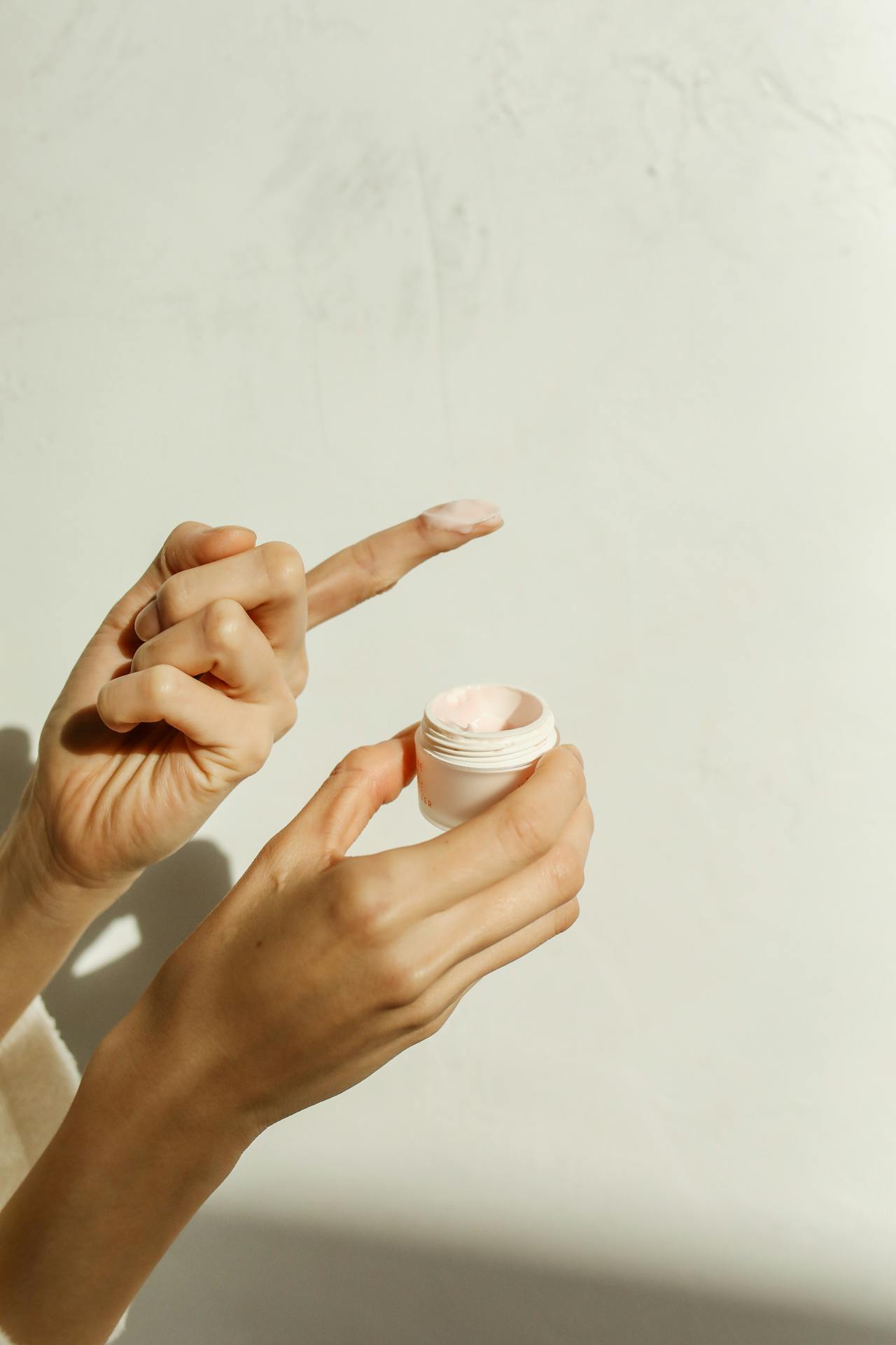 A Person Holding a Beauty Product