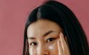 Asian woman using skincare