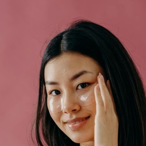Asian woman using skincare