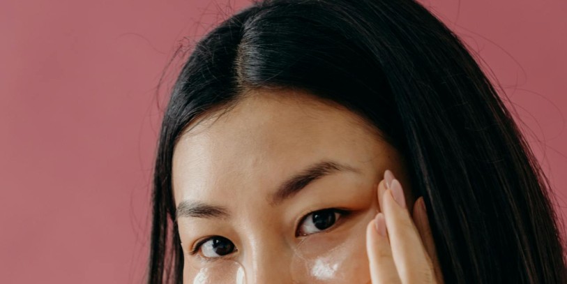 Asian woman using skincare