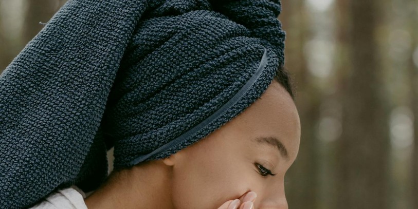 woman applying skin care products