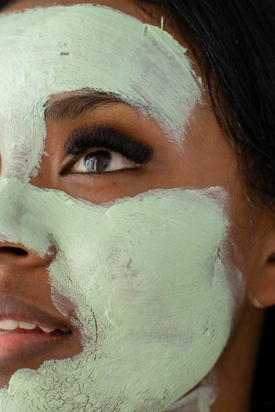 woman with clay mask
