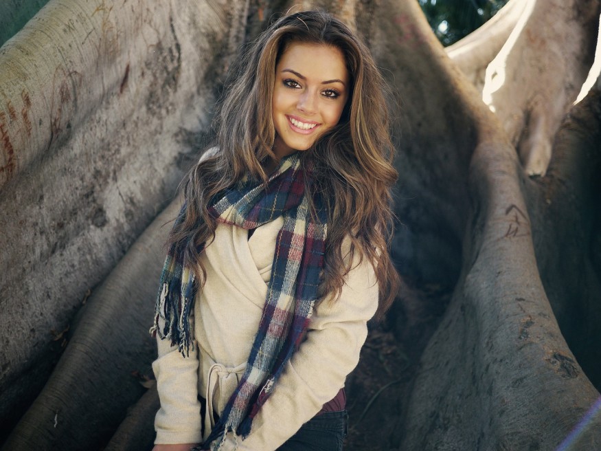 brunette with a pretty smile