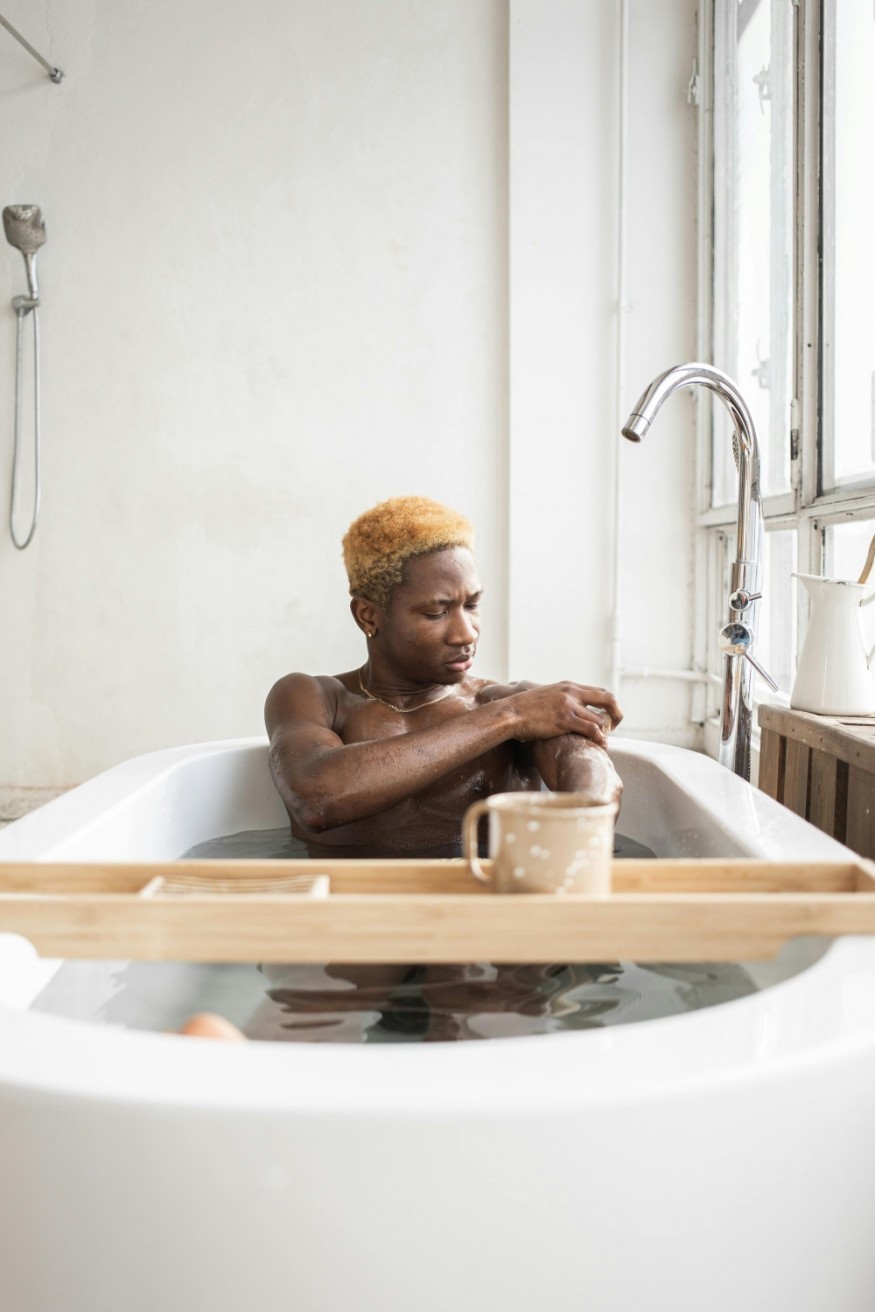 black man using bar soap