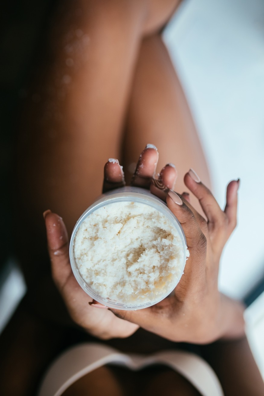 Woman with sugar or salt scrub